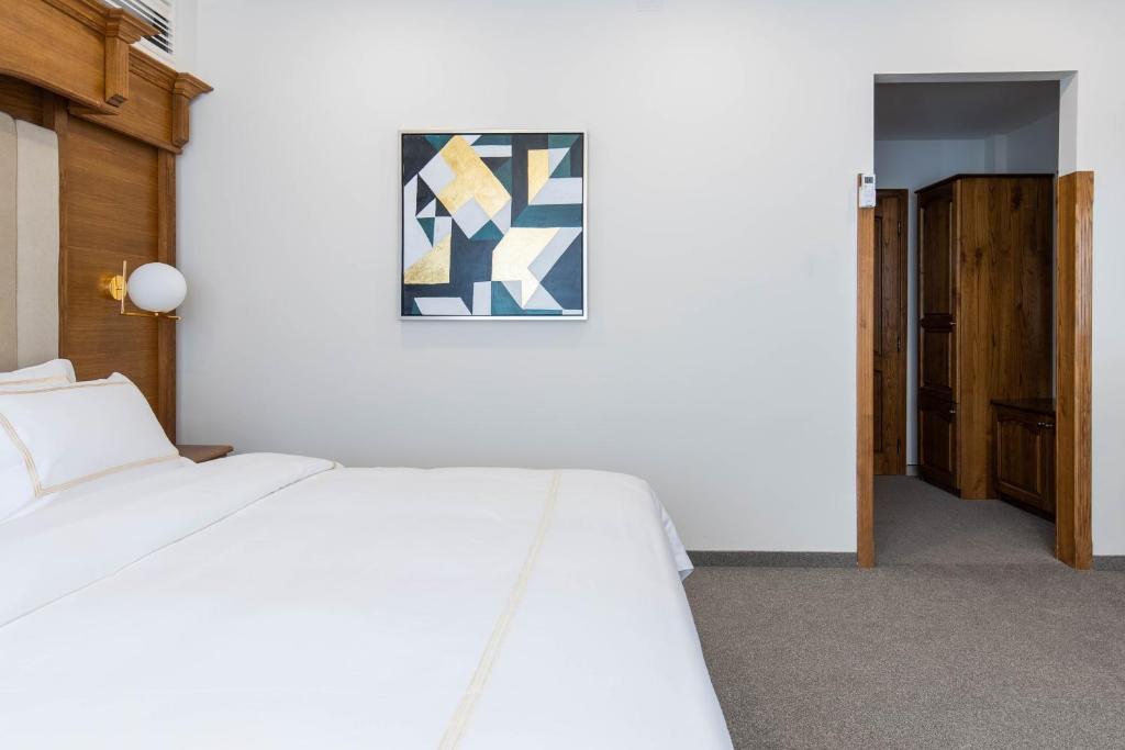 Postel nebo postele na pokoji v ubytování Hotel Afa
