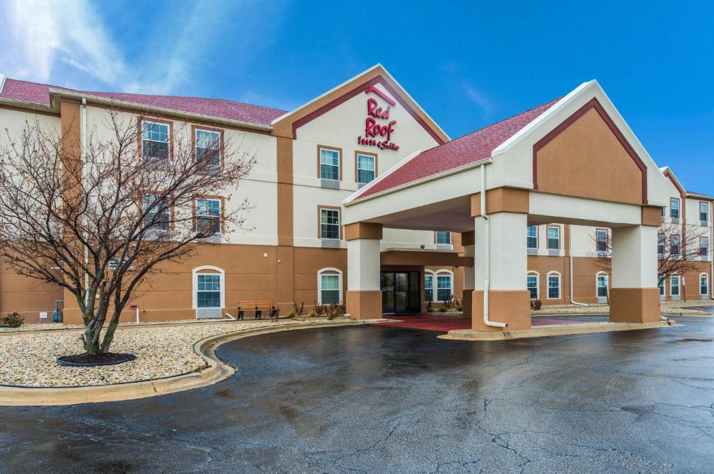 a rendering of a hotel with a parking lot at Red Roof Inn & Suites Monee in Monee