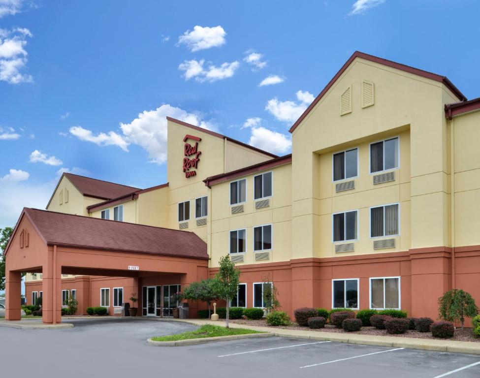 a rendering of a hotel with a parking lot at Red Roof Inn Clyde in Clyde