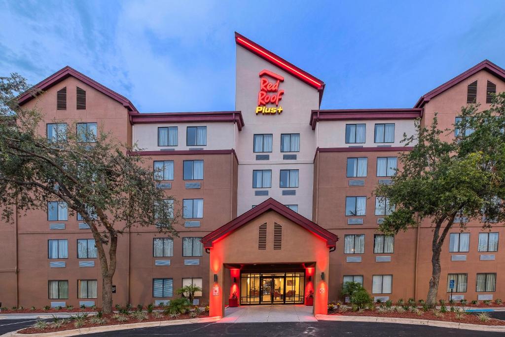 a rendering of the front of a hotel at Red Roof Inn PLUS+ Jacksonville – Southpoint in Jacksonville