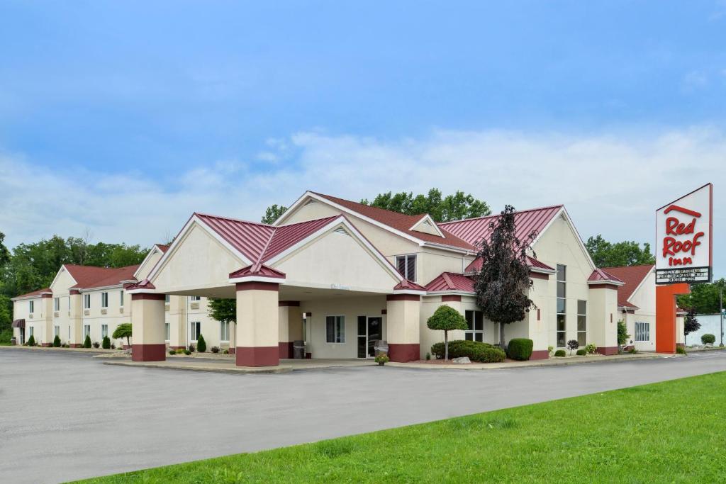 a rendering of a hotel with a for sale sign at Red Roof Inn Sandusky - Milan in Milan