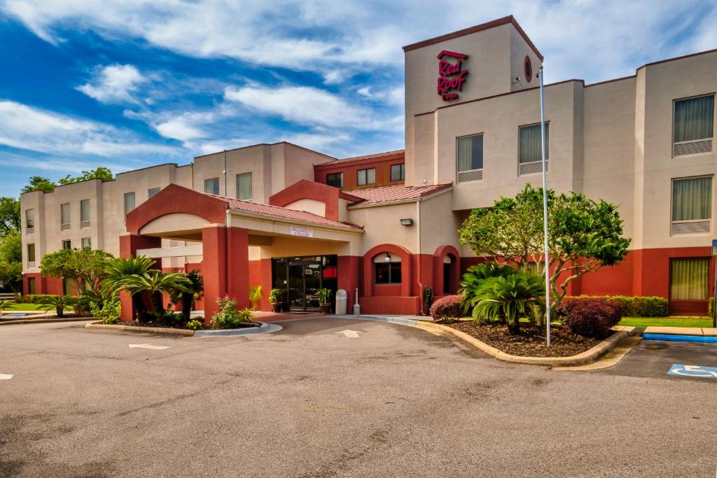 a rendering of the front of a hotel at Red Roof Inn Pensacola Fairgrounds in Pensacola