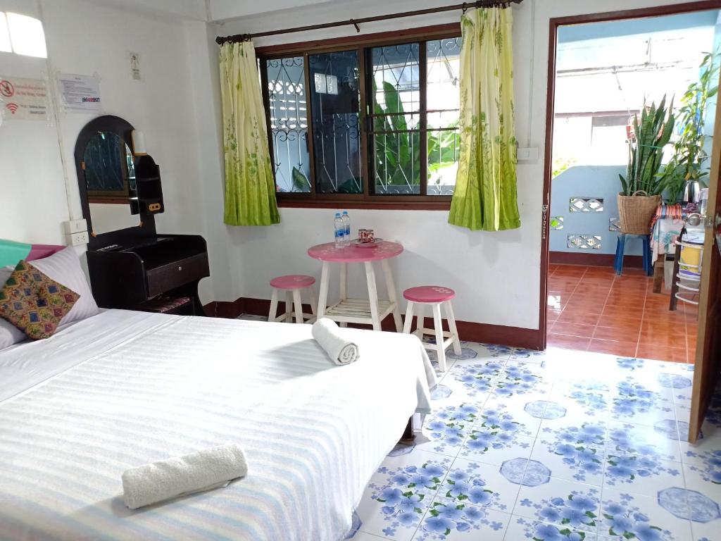 Postel nebo postele na pokoji v ubytování Sabaydee House at Pai