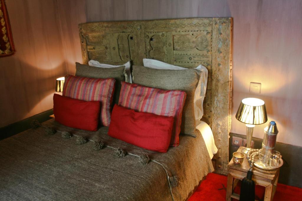 Postel nebo postele na pokoji v ubytování Riad Golfame