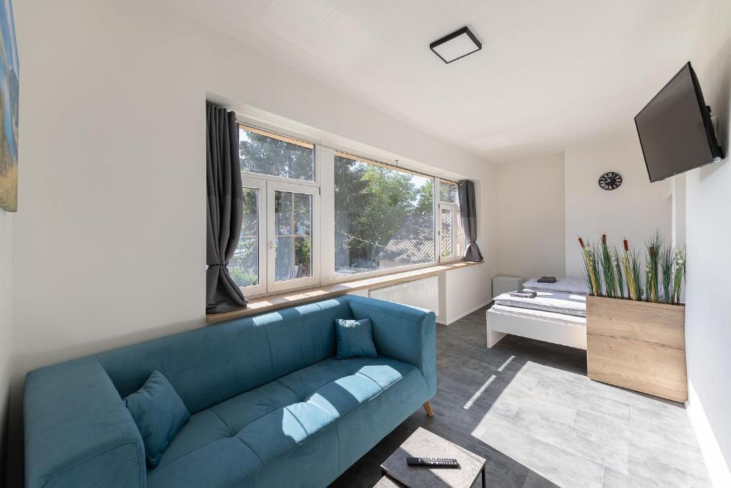 TV a/nebo společenská místnost v ubytování Apartsee Wellness Plzeň