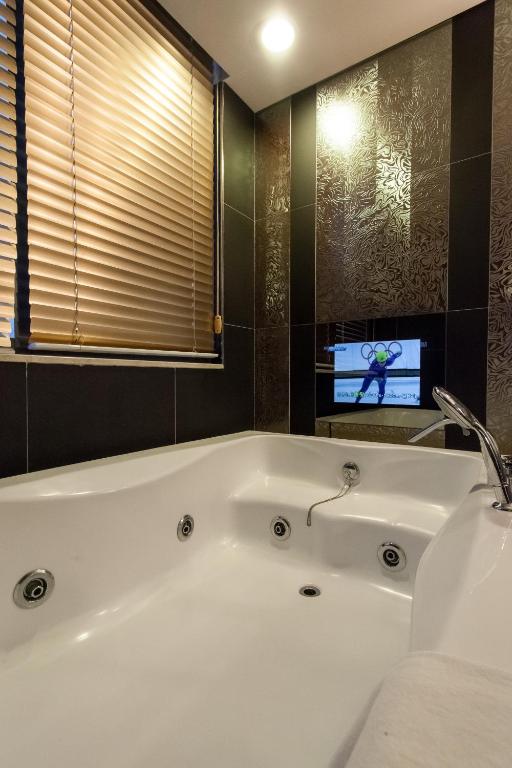 Koupelna v ubytování Hotel Pharos