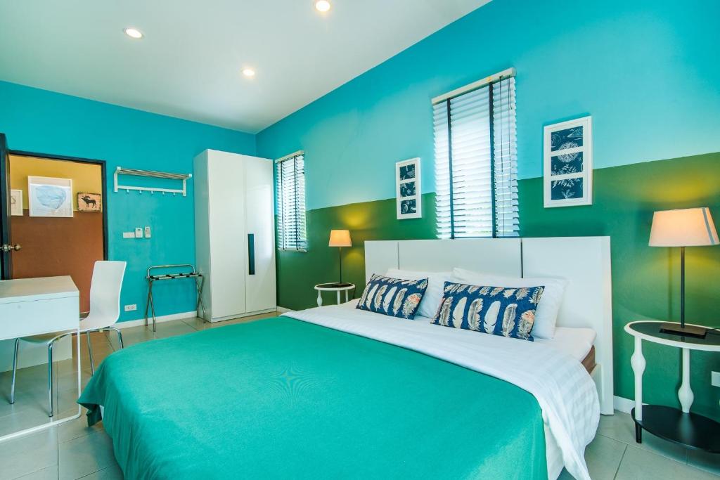 Postel nebo postele na pokoji v ubytování Villa Na Pran, Pool Villa