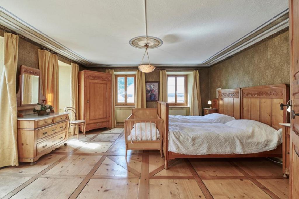 Postel nebo postele na pokoji v ubytování Palazzo