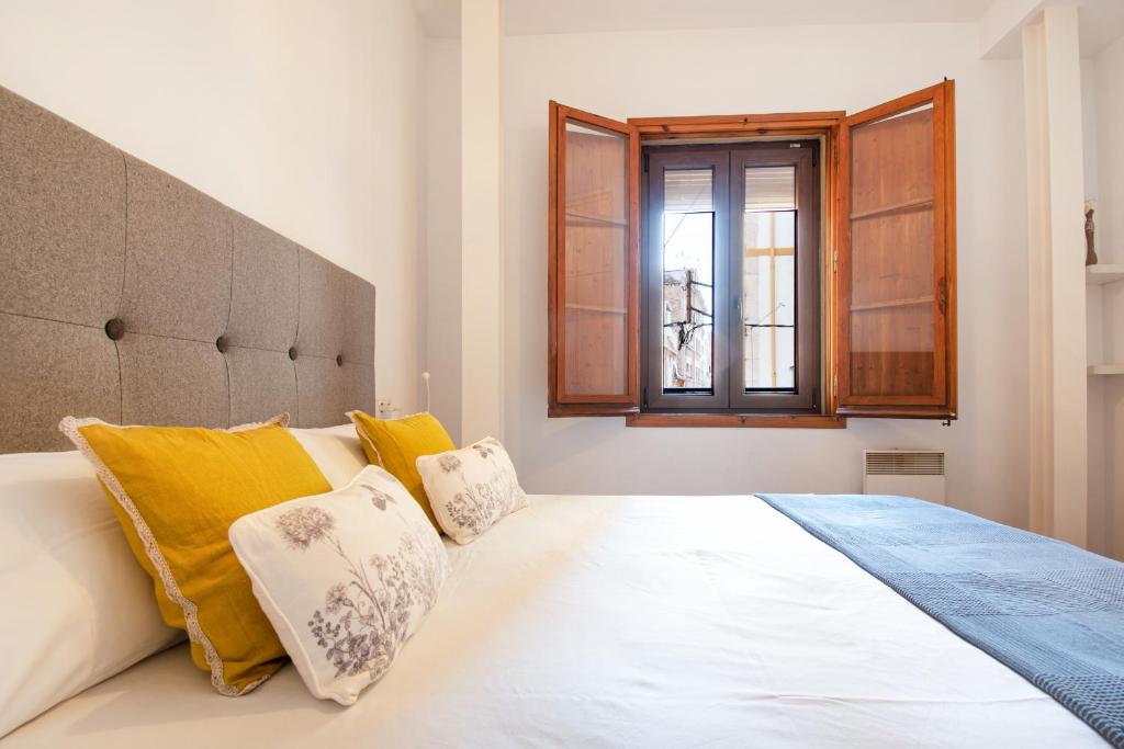 Postel nebo postele na pokoji v ubytování Apartamento en Plaza SEDASSOS Centro Historico