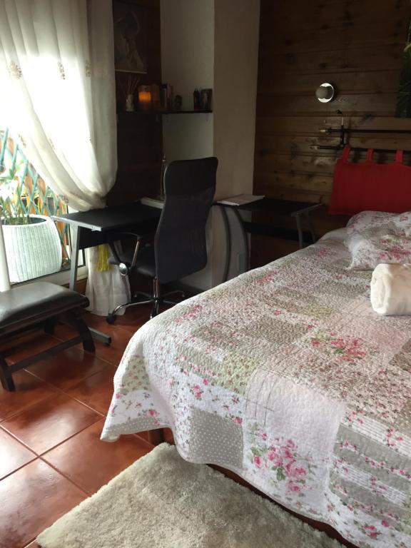 Postel nebo postele na pokoji v ubytování COEUR CREOLE