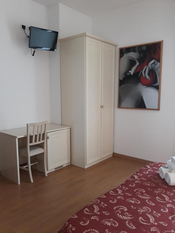 Łóżko lub łóżka w pokoju w obiekcie Hotel La Palazzina