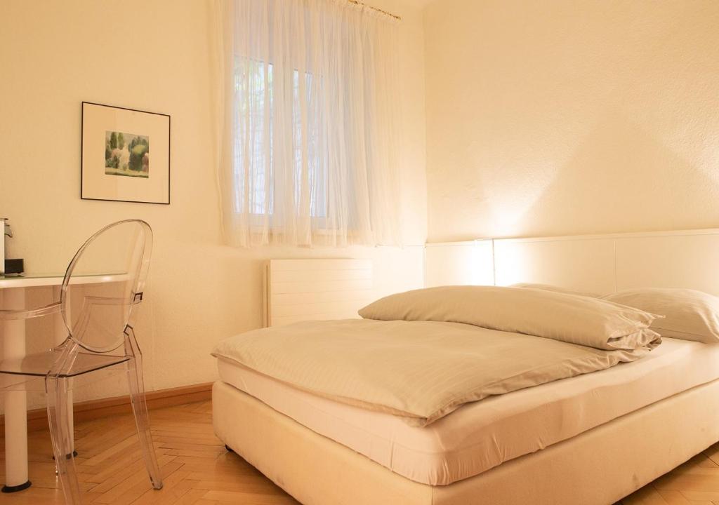 Postel nebo postele na pokoji v ubytování Boutique Hotel Hauser
