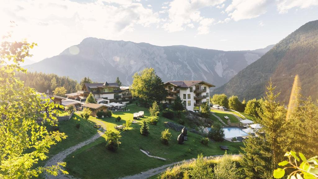 an aerial view of a resort in the mountains at Hotel Ritzlerhof - Adults only in Sautens