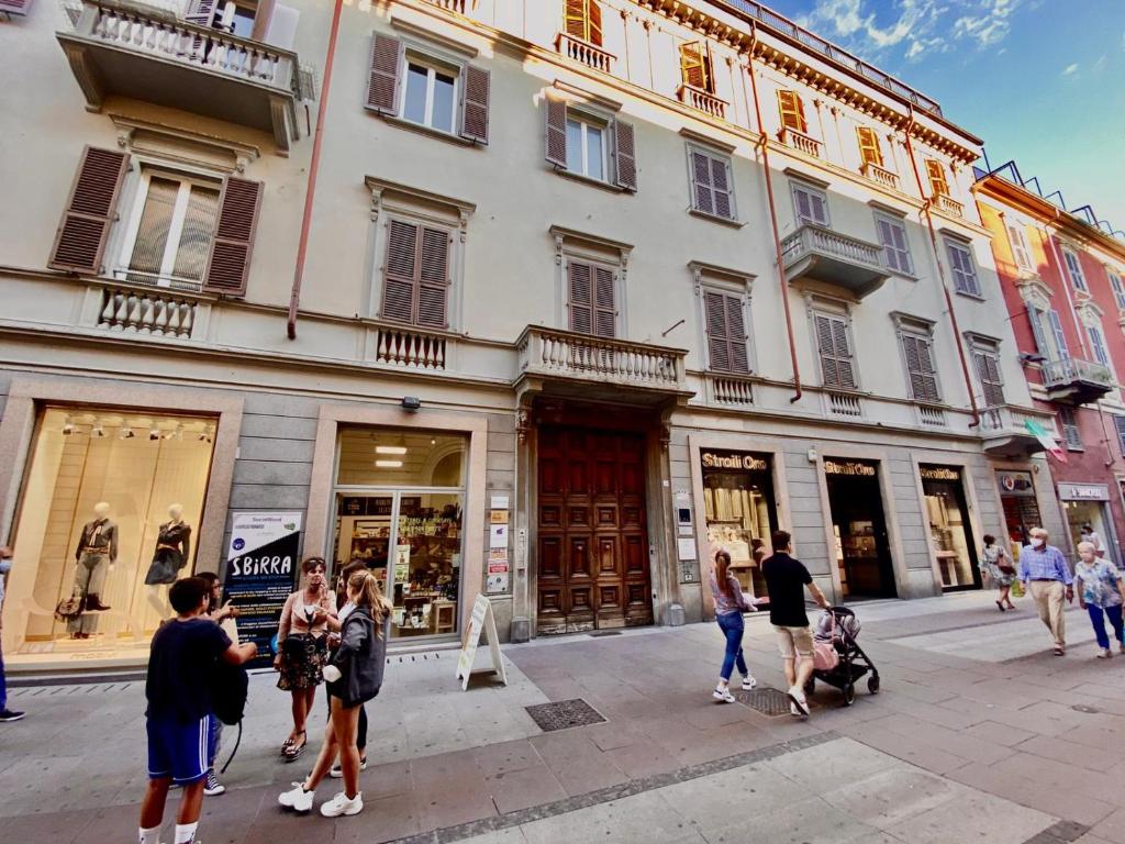 a group of people standing outside of a building at HH Hermoso Housing ALESSANDRIA in Alessandria