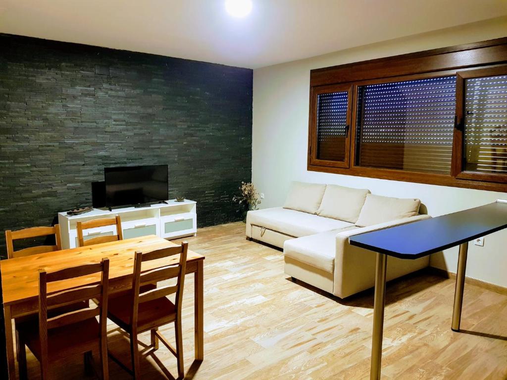 Posezení v ubytování APARTAMENTOS LOS ÁLAMOS