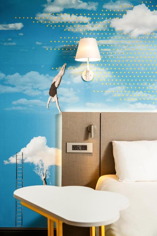 Кровать или кровати в номере ibis Styles Manchester Portland