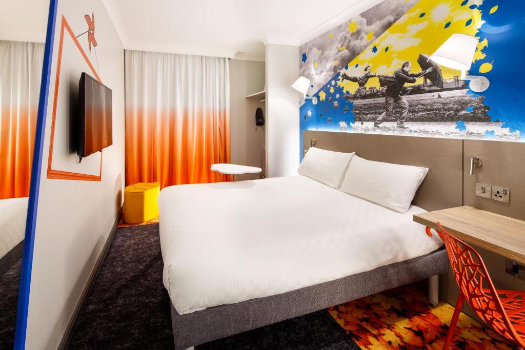 Кровать или кровати в номере ibis Styles Manchester Portland