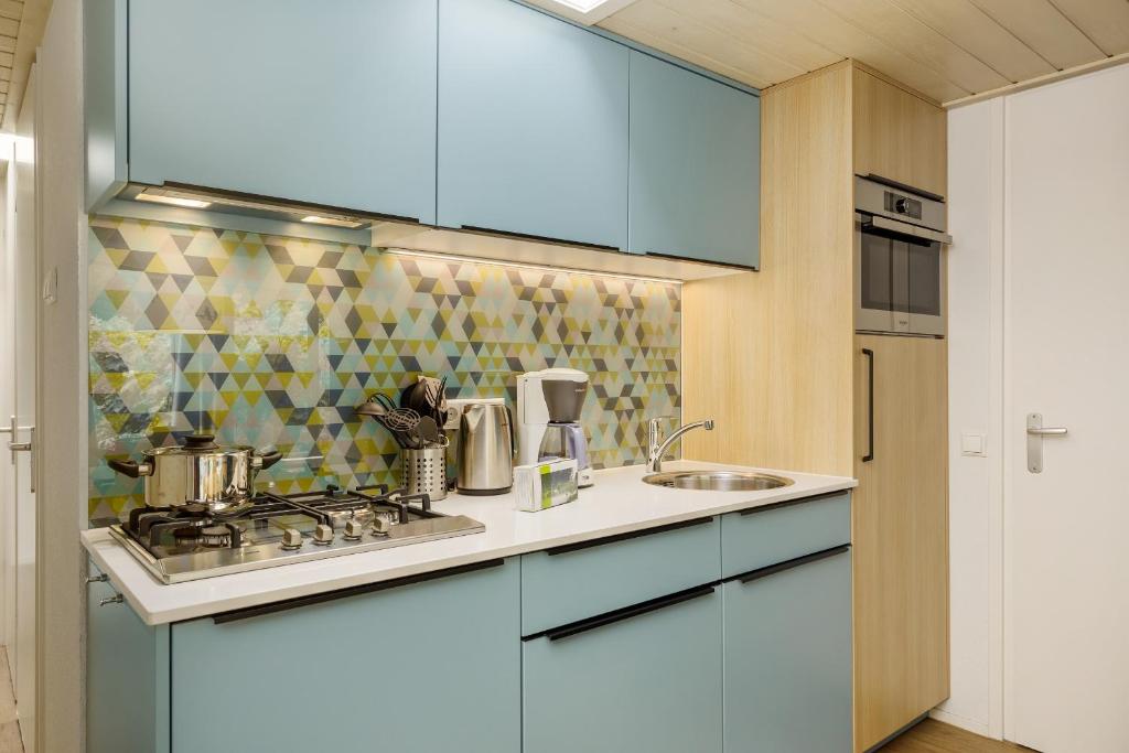 Kuchyň nebo kuchyňský kout v ubytování Center Parcs De Eemhof