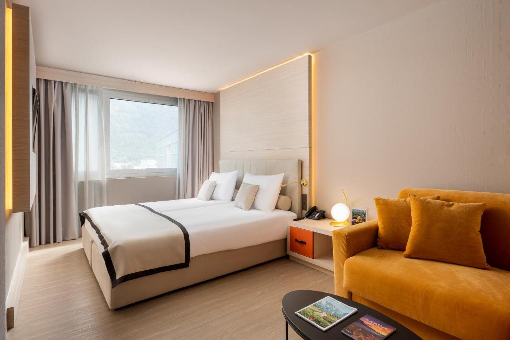 Postel nebo postele na pokoji v ubytování Hotel Vatel 4* Superior