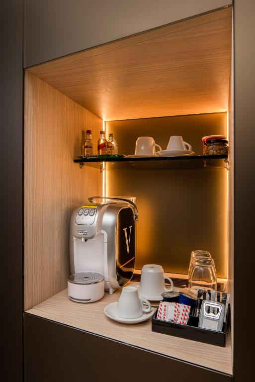 Příslušenství pro přípravu čaje a kávy v ubytování Hotel Vatel 4* Superior