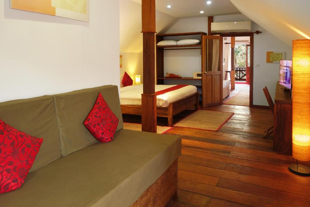 Ein Bett oder Betten in einem Zimmer der Unterkunft Sok San Beach Resort