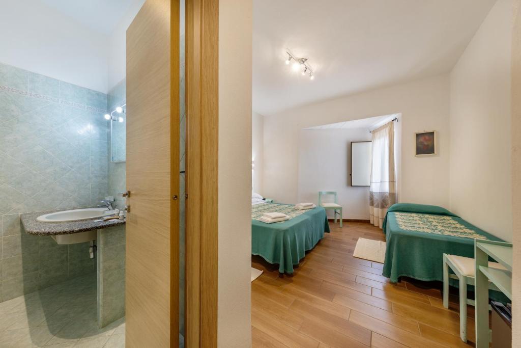 Hotel Le Mimose - Dreibettzimmer