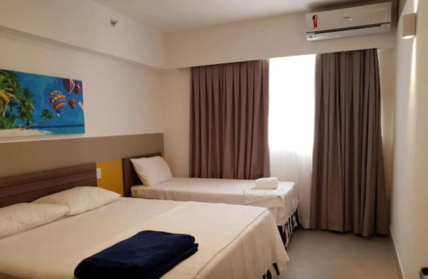 Katil atau katil-katil dalam bilik di Olímpia - Apartamento 1 quarto - Enjoy - Olimpia Park Resort - Em frente ao Park