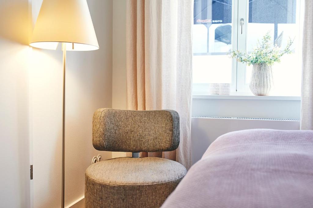 Postel nebo postele na pokoji v ubytování BUITERLING Hotel