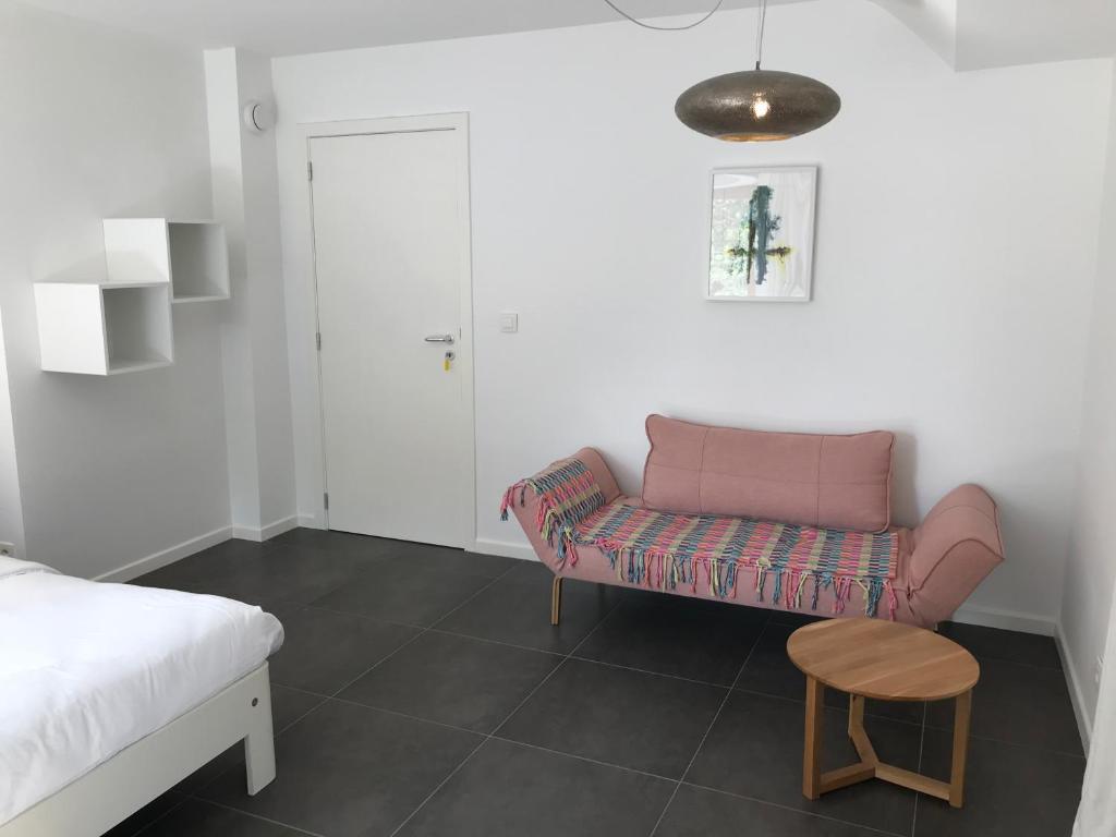 Postel nebo postele na pokoji v ubytování Espaces d'Or