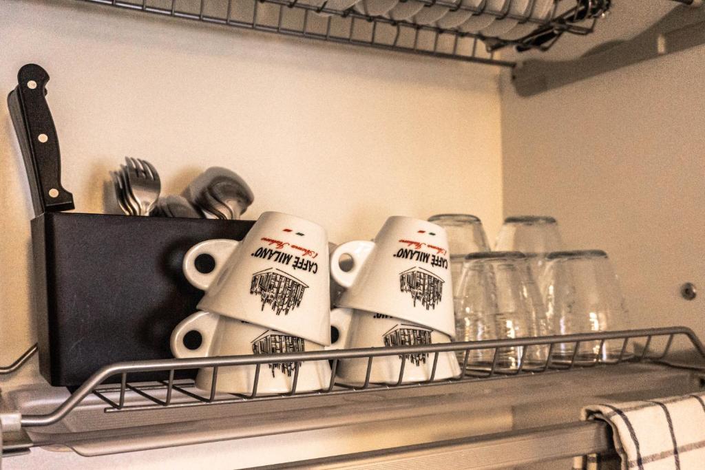 Kuchyň nebo kuchyňský kout v ubytování Aparthotel Meneghino