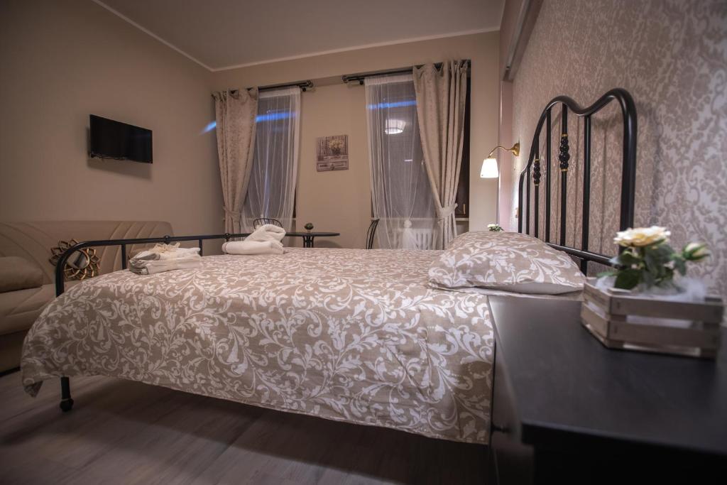 Postel nebo postele na pokoji v ubytování Domus Mariae B&B Assisi