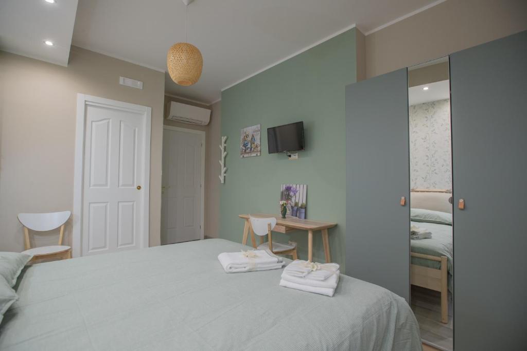 Postel nebo postele na pokoji v ubytování Domus Mariae B&B Assisi