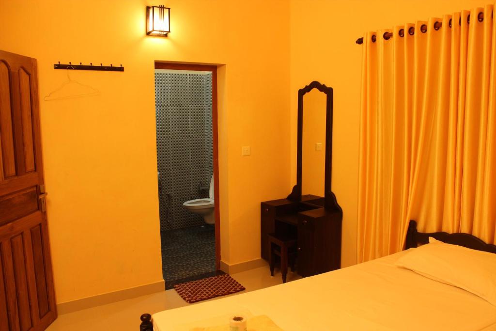 Postel nebo postele na pokoji v ubytování Bastian Homestay
