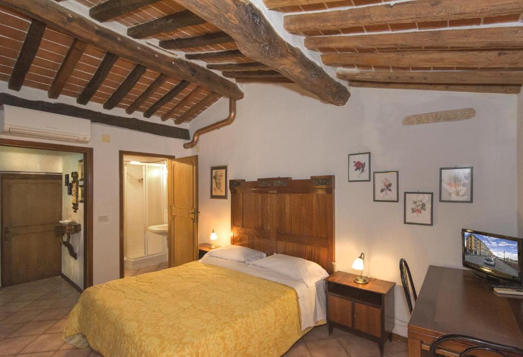Postel nebo postele na pokoji v ubytování B&B Due Borghi