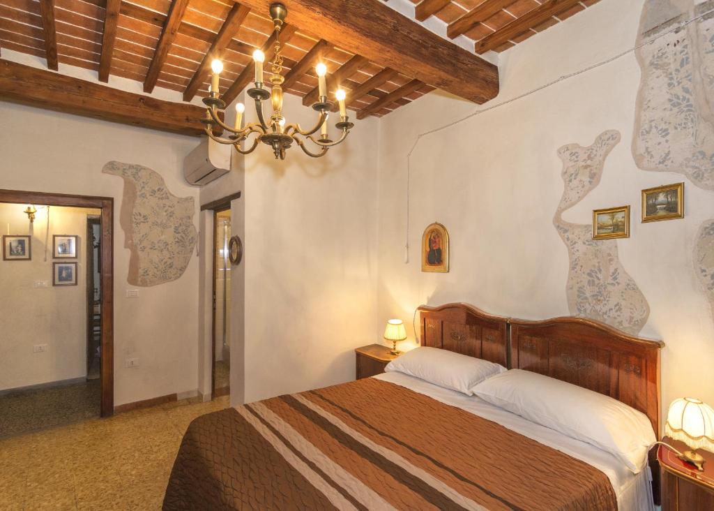 Postel nebo postele na pokoji v ubytování B&B Due Borghi