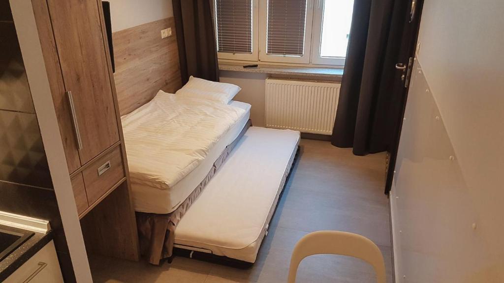Postel nebo postele na pokoji v ubytování Pentagos