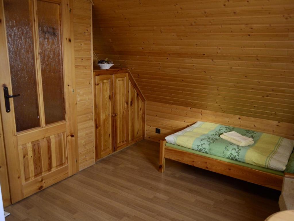 Postel nebo postele na pokoji v ubytování Chalupa u Urbanov