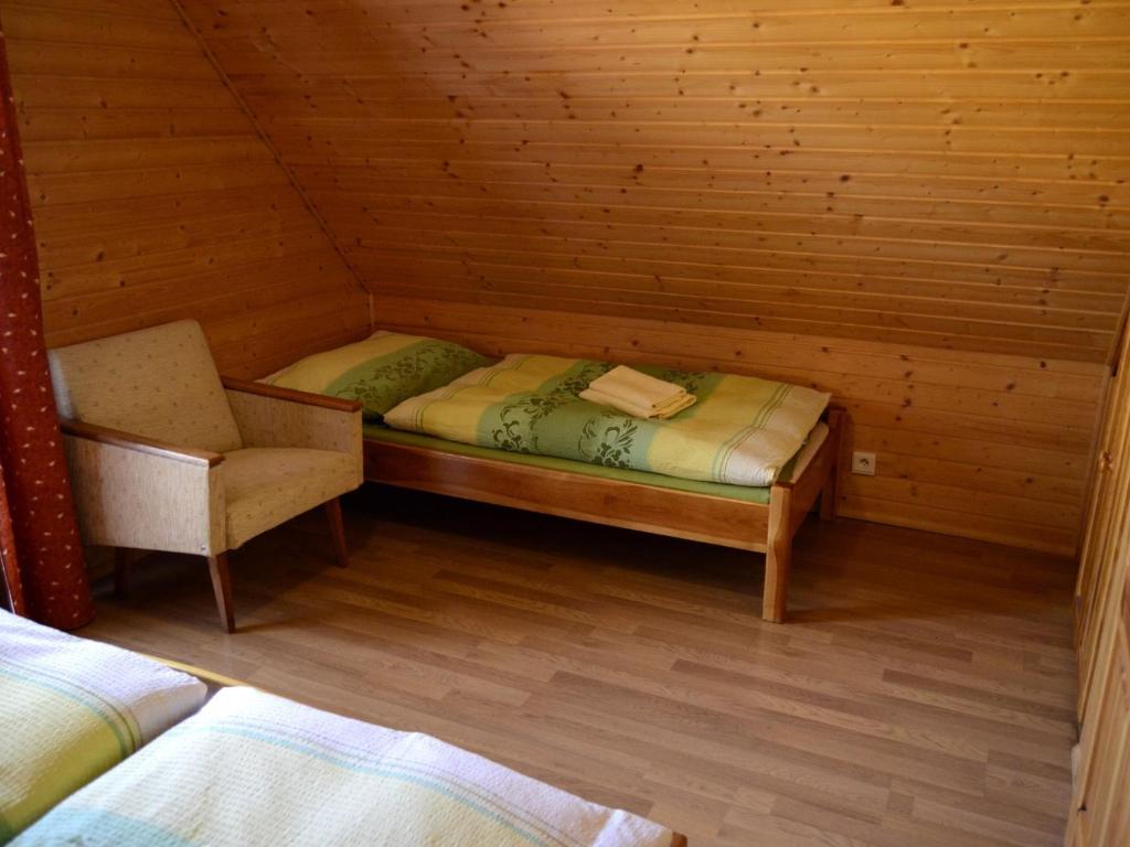 Postel nebo postele na pokoji v ubytování Chalupa u Urbanov