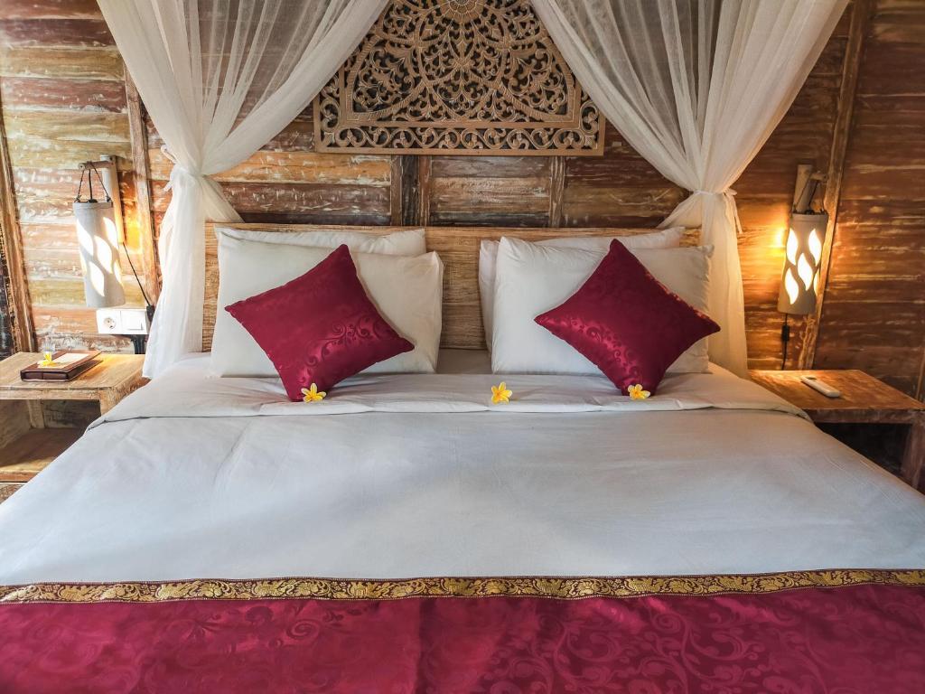 Postel nebo postele na pokoji v ubytování Aswanaya Villas Ubud