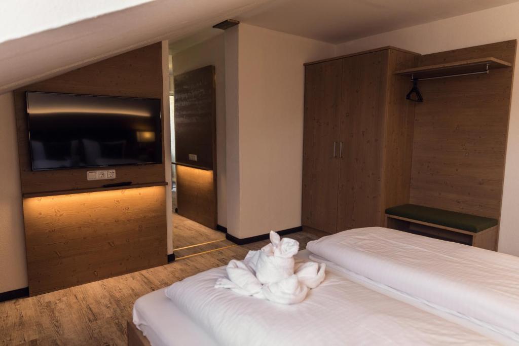 Postel nebo postele na pokoji v ubytování Waldhotel Seebachschleife