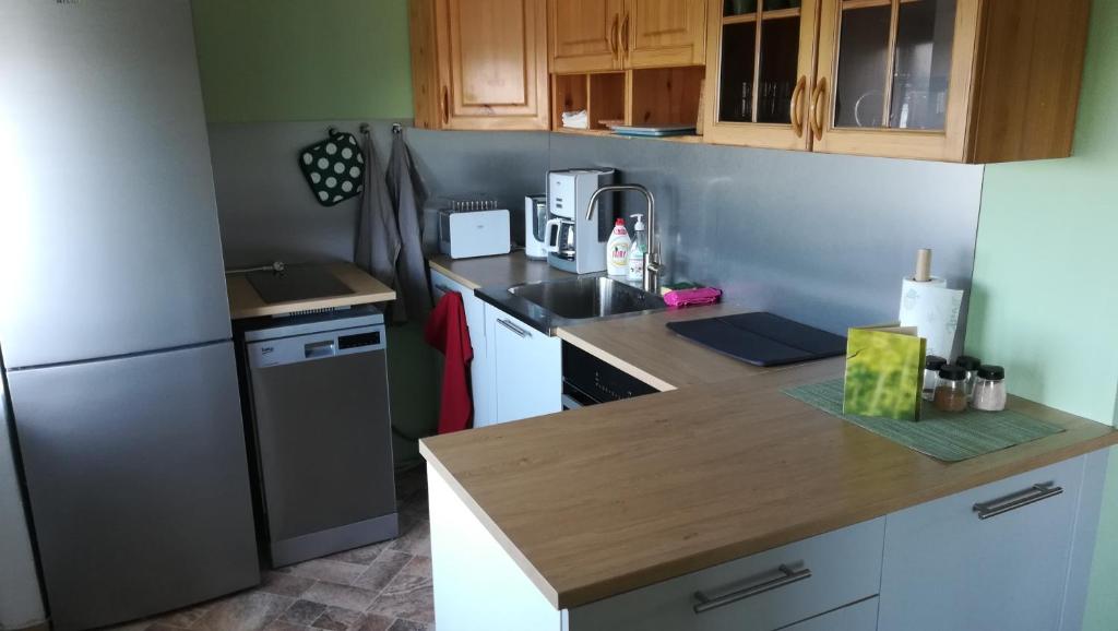 Kuchyň nebo kuchyňský kout v ubytování Central MaxiStay