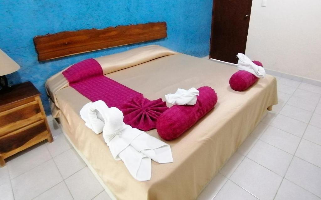 Postel nebo postele na pokoji v ubytování Paraíso Seyba Hotel