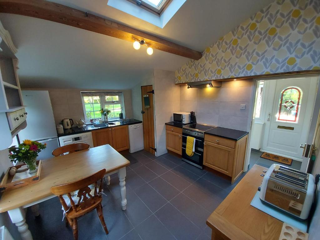 Kuchyň nebo kuchyňský kout v ubytování Saughall Mill Farm Cottage
