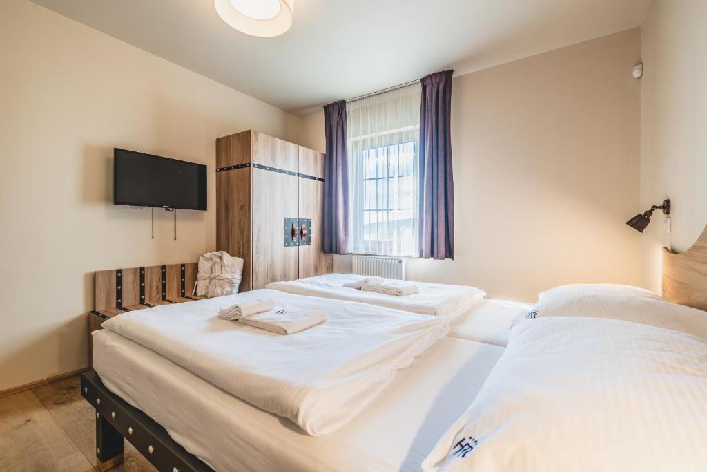 Postel nebo postele na pokoji v ubytování Hotel Resort Relax