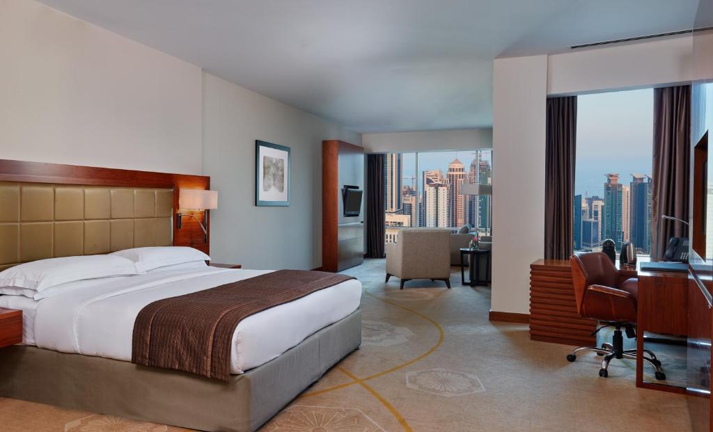 Łóżko lub łóżka w pokoju w obiekcie InterContinental Doha The City by IHG