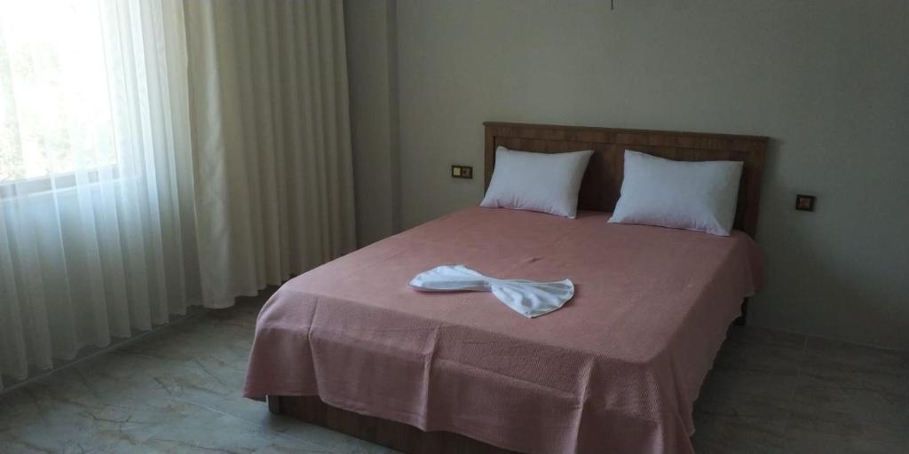 Postel nebo postele na pokoji v ubytování Olive Tree Apart Hotel