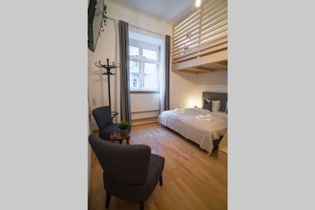 Posteľ alebo postele v izbe v ubytovaní Cosy and Spacious Apartment in the heart of Innsbruck