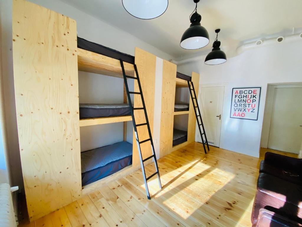 a room with two bunk beds in it at City Backpackers Hostel in Stockholm