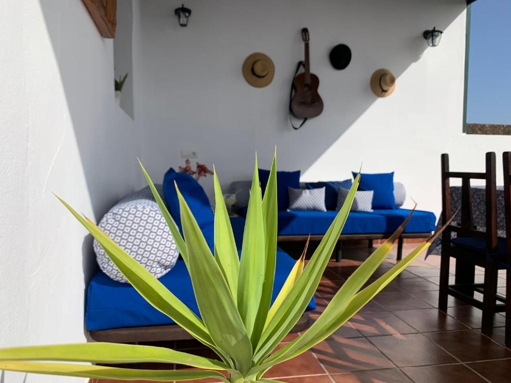 A seating area at Pico Partido villa heated pool