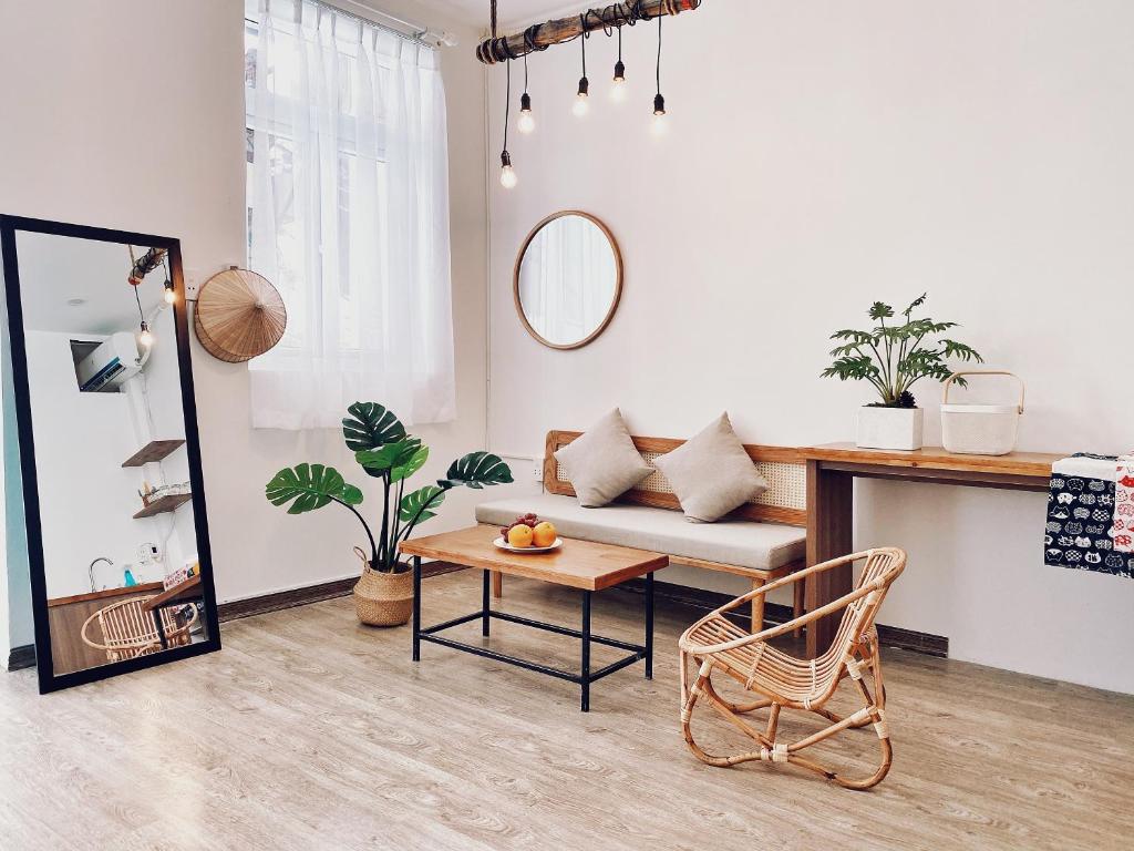 Posezení v ubytování Vevy House - Homestay in Town